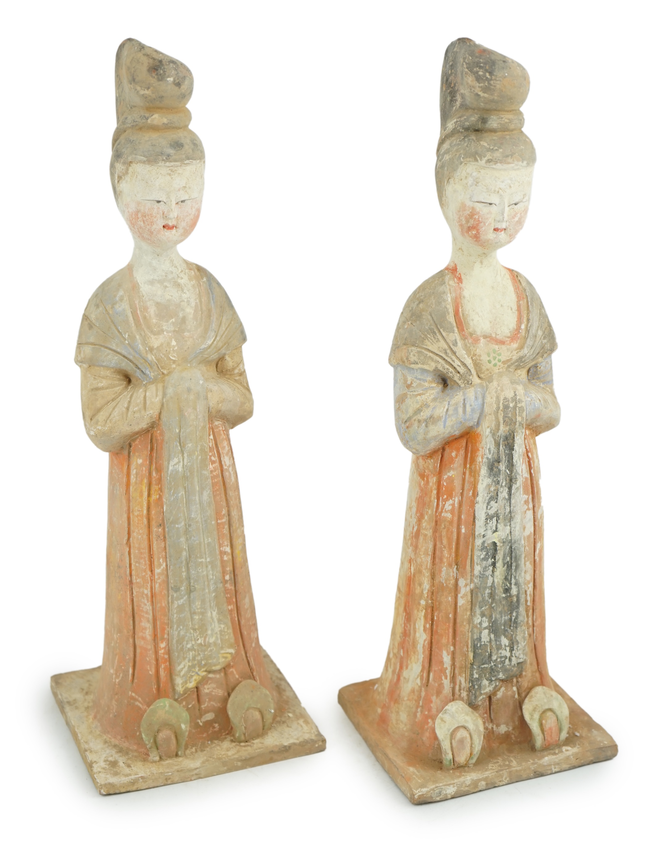 A pair of Chinese Tang style painted pottery ladies, 44.5cm